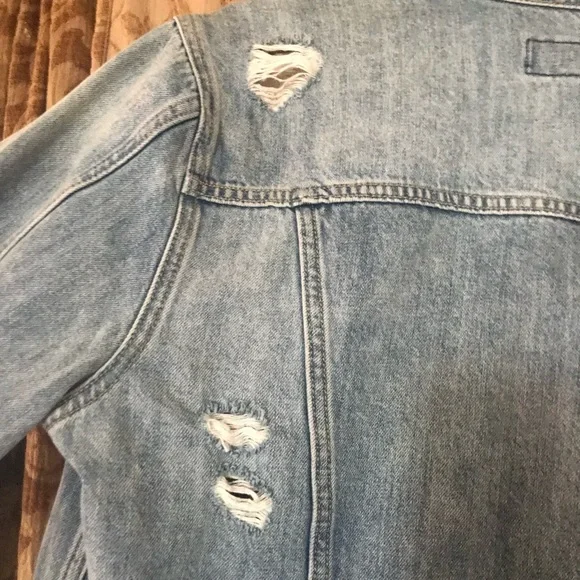 Distressed jean jacket, lots of rips and vintage looking. Comfy too - Picture 5 of 7